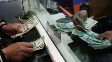 سعر صرف الدولار بالعراق مقابل الدينار العراقي.. السوق السوداء تتحرك